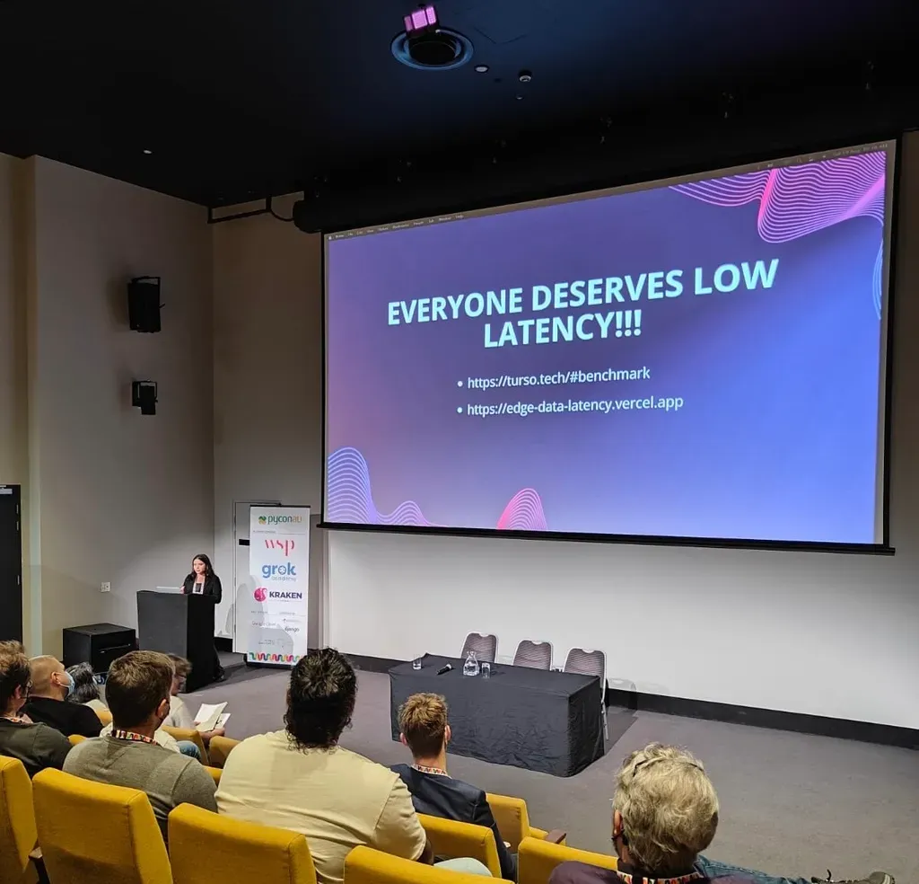 A slide reading "Everyone deserves low latency!!!" at PyCon Australia