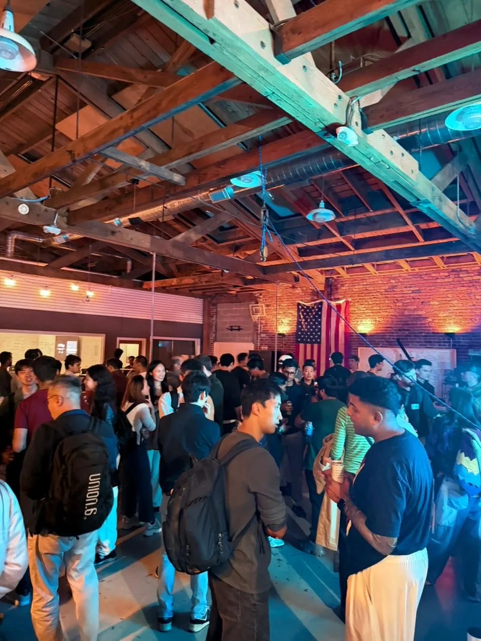 A packed crowd at the Dimensional robotics event in San Francisco